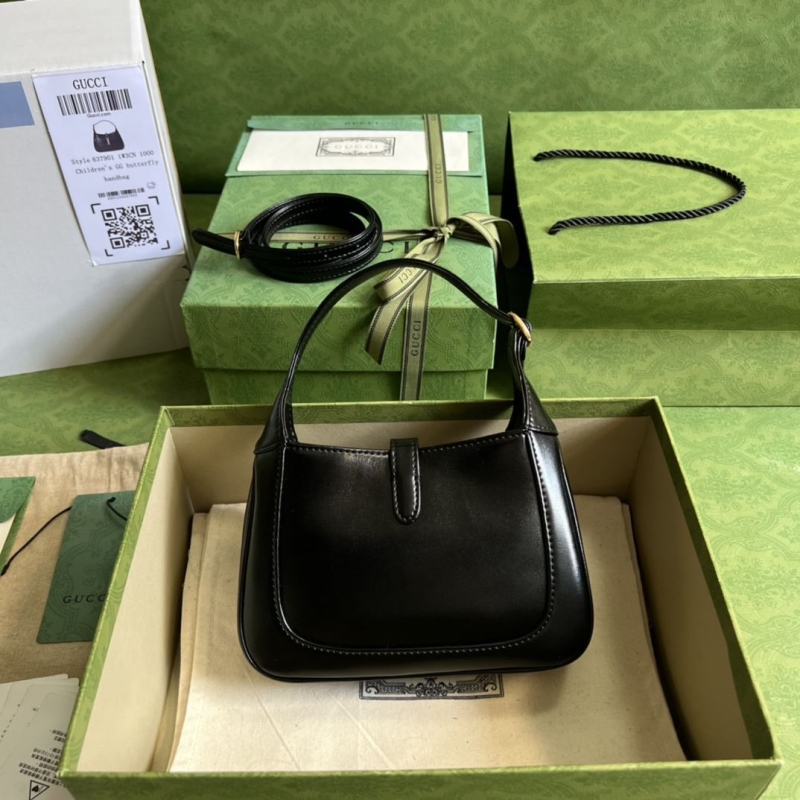 G*u*i top handle bags